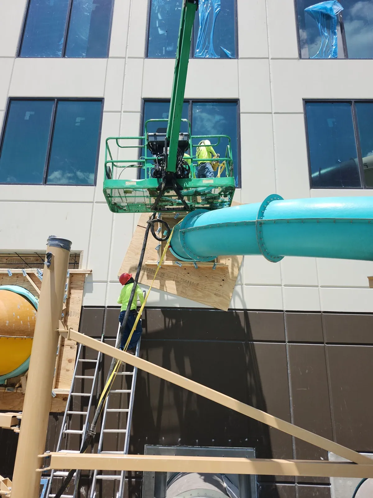 MTD crew on a lift beside a waterslide at Great Wolf Naples