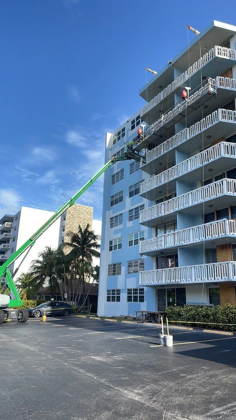 MTD lift crew working on a high-rise at Hallandale Towers