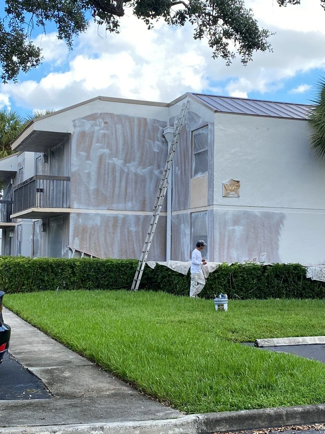 Jacaranda Village building prepped and primed for repaint