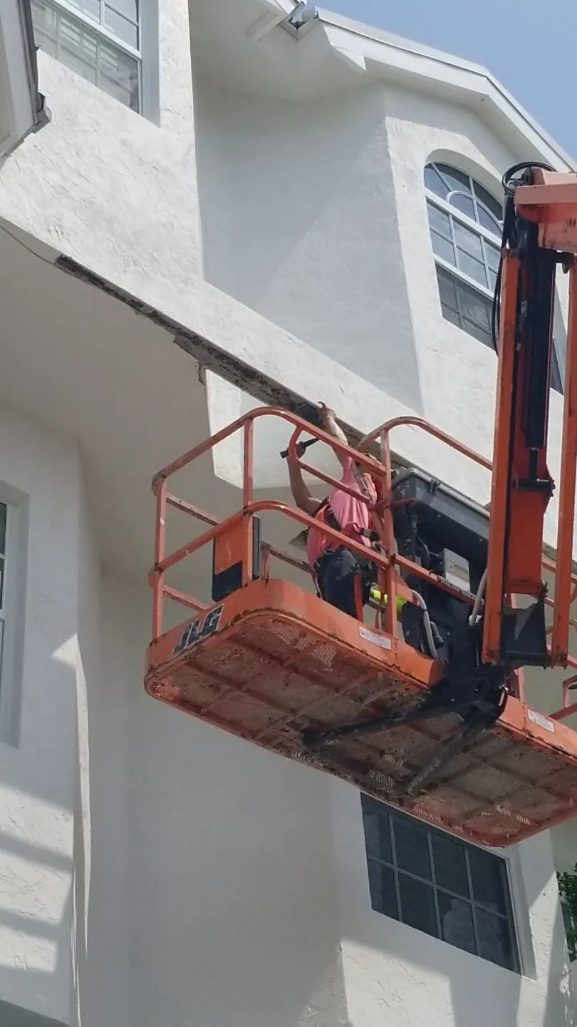 MTD crew on a boom lift at Jupiter Key