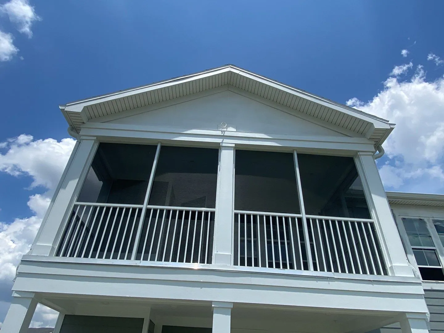 Screened porch after painting at a Springs community